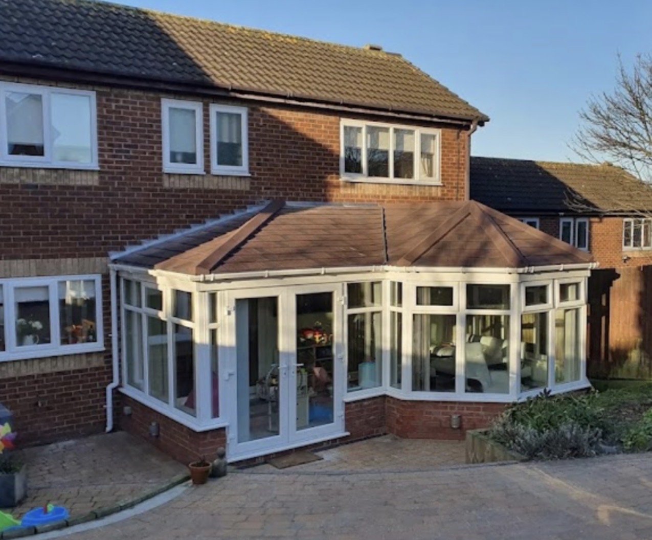 Terracotta tiled warm conservatory roof transformation by LMD